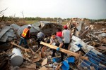 First responders and residents recover amid the aftermath of a deadly tornado in Moore, Okla. timephotographers