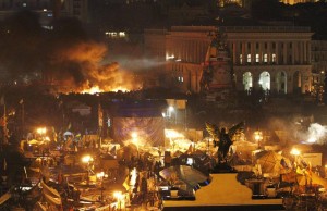 Smoke rises above burning barricades at Independence Square 