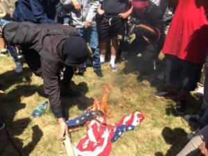 trump-protesters-burn-american-flag-twitter-ajplus-575x431